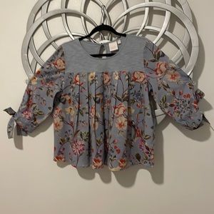 Lauren Conrad mixed fabric baby doll top.